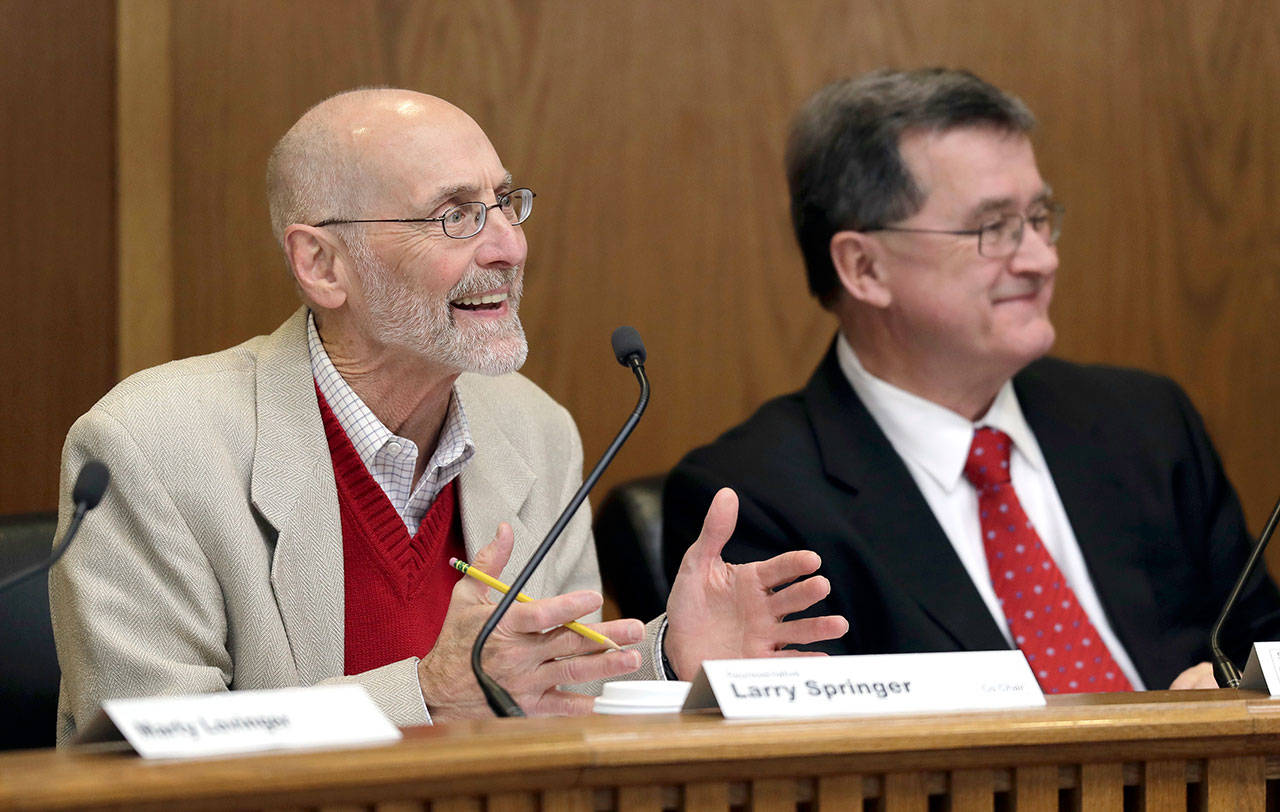 Rep. Larry Springer, D-Kirkland, left, co-chair of the Legislative Task Force on Public Records, speaks Friday as he sits next to co-chair Sen. Curtis King, R-Yakima during a task force work session at the Capitol in Olympia. The panel was formed after a lawsuit produced a ruling that state legislators are subject to Washington state’s public records law. (Ted S. Warren/The Associated Press)