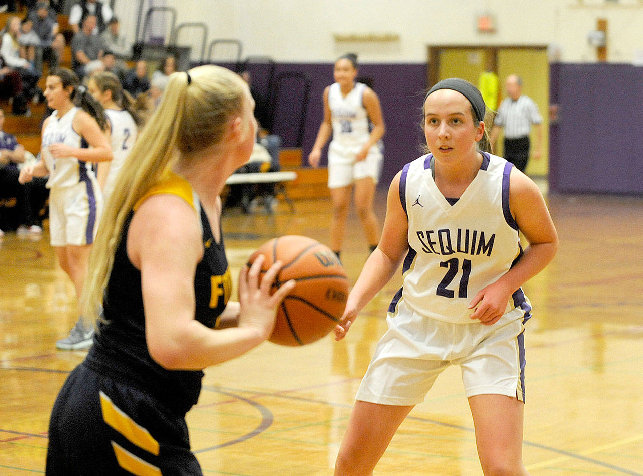 Michael Dashiell/Olympic Peninsula News Group Sequim’s Kalli Wiker defends against Forks. Wiker has been a big contributor on a team that has started the season 6-0.