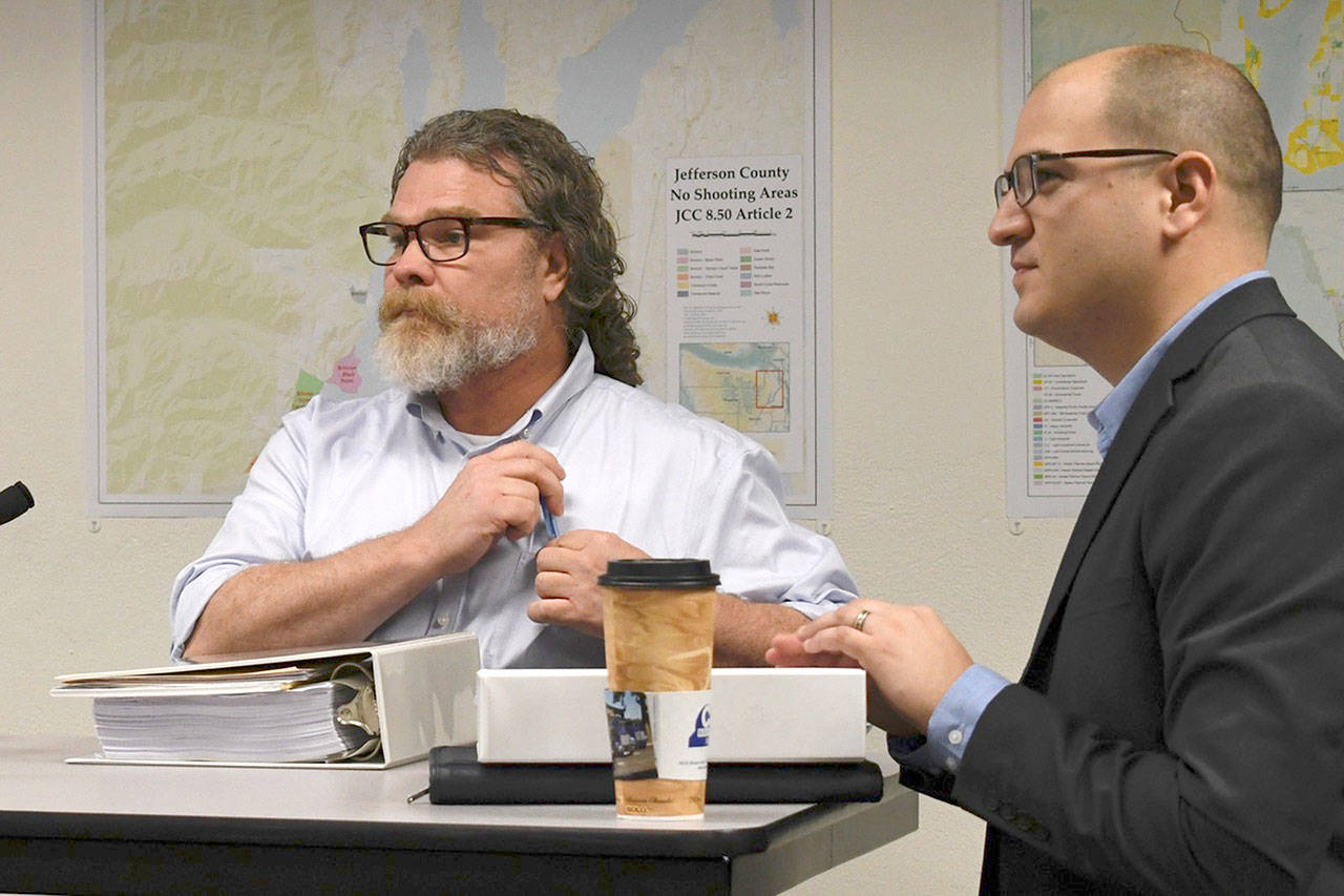 Project Manager and Associate Planner Joel Peterson, left, and Planning Manager Austin Watkins presented the 2018 Jefferson County Comprehensive Plan for final discussion and approval to the Board of County Commissioners on Monday. (Jeannie McMacken/Peninsula Daily News)
