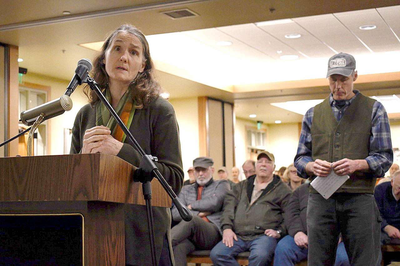 Sonia Story of Chimacum was one of 52 speakers to provide testimony to the Jefferson County commissioners Monday night during a hearing on the draft ordinance harmonizing Title 18 of the Jefferson County Code with the draft Commercial Shooting Facilities Ordinance. Story asked that fear of threat not be a basis for making a decision and that if they choose between love or money, they should choose love. (Jeannie McMacken/Peninsula Daily News)