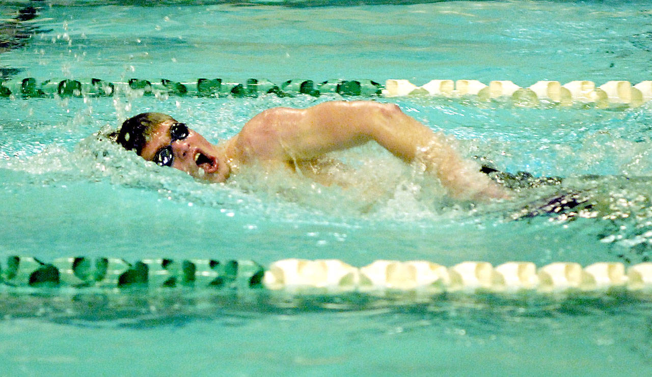 Keith Thorpe/Peninsula Daily News Sequim’s Jax Thaxton swims to victory in the 100-yard freestyle swimming event on Thursday at William Shore Memorial Pool in Port Angeles.