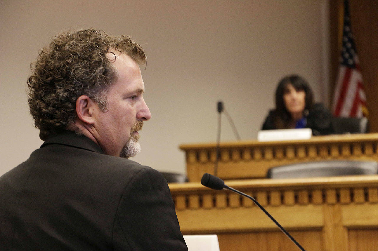 Sen. Kevin Ranker, a Democrat from Orcas Island, listens during a hearing in Olympia on Feb. 5, 2015. The state Senate is conducting an outside investigation into Ranker following allegations of improper conduct. (Rachel La Corte/The Associated Press)