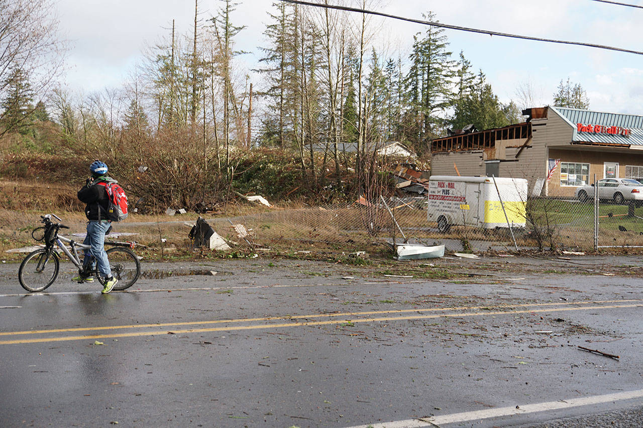 A tornado described as at least 600 yards wide swept across Bethel Avenue in Port Orchard at 2 p.m. Tuesday. It damaged commercial buildings in its path and reportedly took the roof off a nearby home. (Bob Smith/Kitsap News Group)
