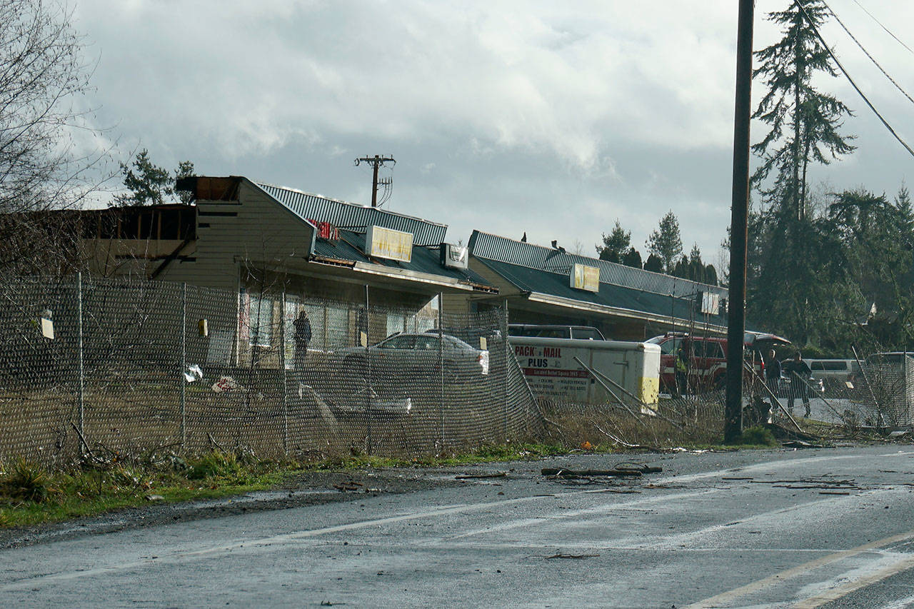 A tornado swept across Bethel Avenue in Port Orchard on Tuesday afternoon. It damaged commercial buildings in its path and took the roof off a nearby home. (Bob Smith/Kitsap News Group)