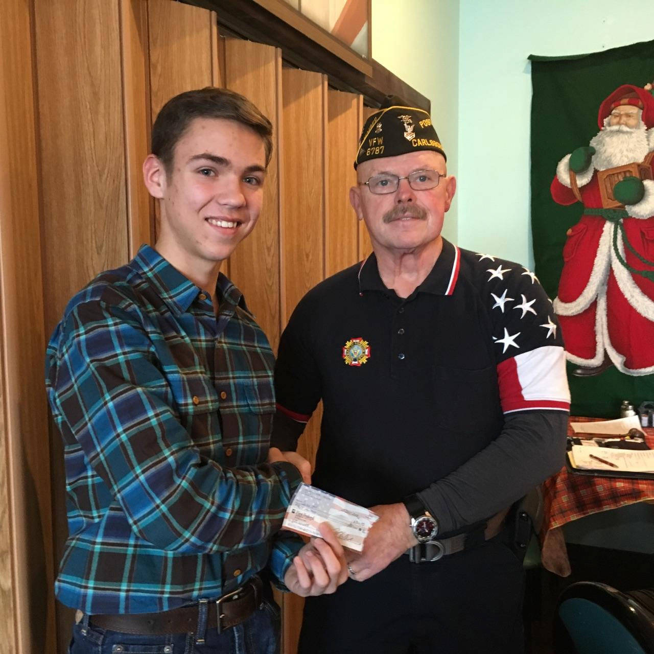 Sequim High School junior Carson Holt has been chosen by VFW District 14 as the Voice of Democracy essay contest entrant. With Holt is Rod Lee of the Carlsborg VFW.