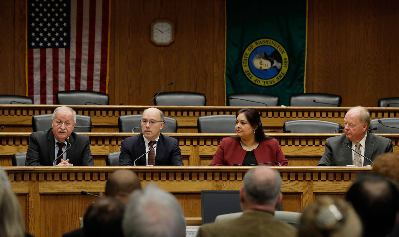 From left, House Speaker Frank Chopp, D-Seattle; Sen. Keith Wagoner, R-Sedro-Woolley, the ranking Republican on the Behavioral Health Subcommittee; Sen. Manka Dhingra, D-Redmond, chairwoman of the Behavioral Health Subcommittee; and Sen. Joe Schmick, R-Colfax, ranking Republican on the House Health Care and Wellness Committee, take part in the Mental Health Reform Panel discussion during the Associated Press Legislative Preview on Thursday at the Capitol in Olympia. (Ted S. Warren/The Associated Press)