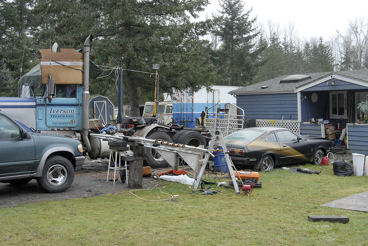 The Bear Meadow Road site of a triple homicide in late December sits idle Friday as authorities continue to investigate the incident east of Port Angeles. (Keith Thorpe/Peninsula Daily News)
