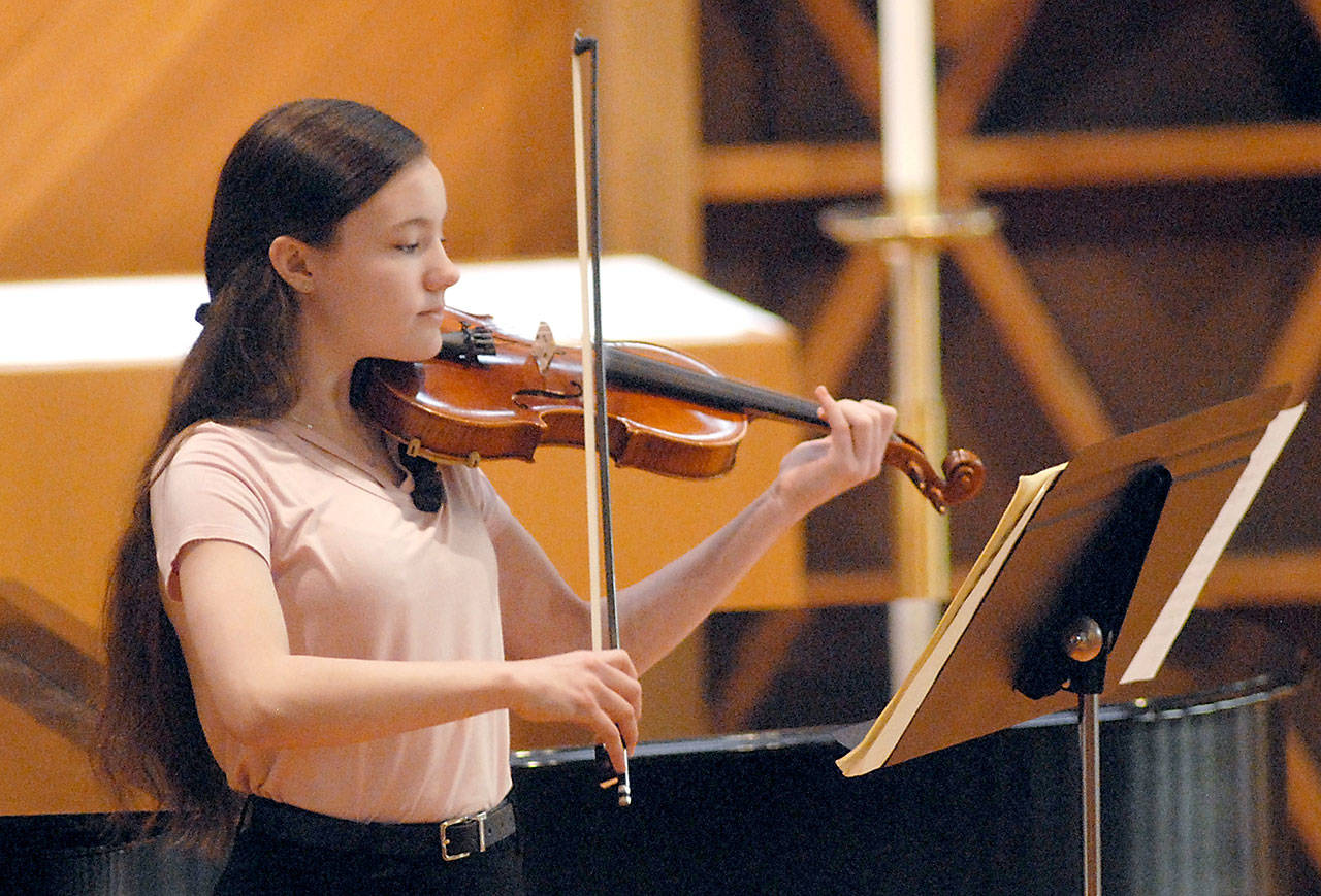 Courtney Smith, 14, an eighth-grade student at Stevens Middle School in Port Angeles, performs for the judges during Saturday’s Nico Snel Young Artist Competition at Holy Trinity Lutheran Church in Port Angeles. Courtney won first place in the junior division. (Keith Thorpe/Peninsula Daily News)