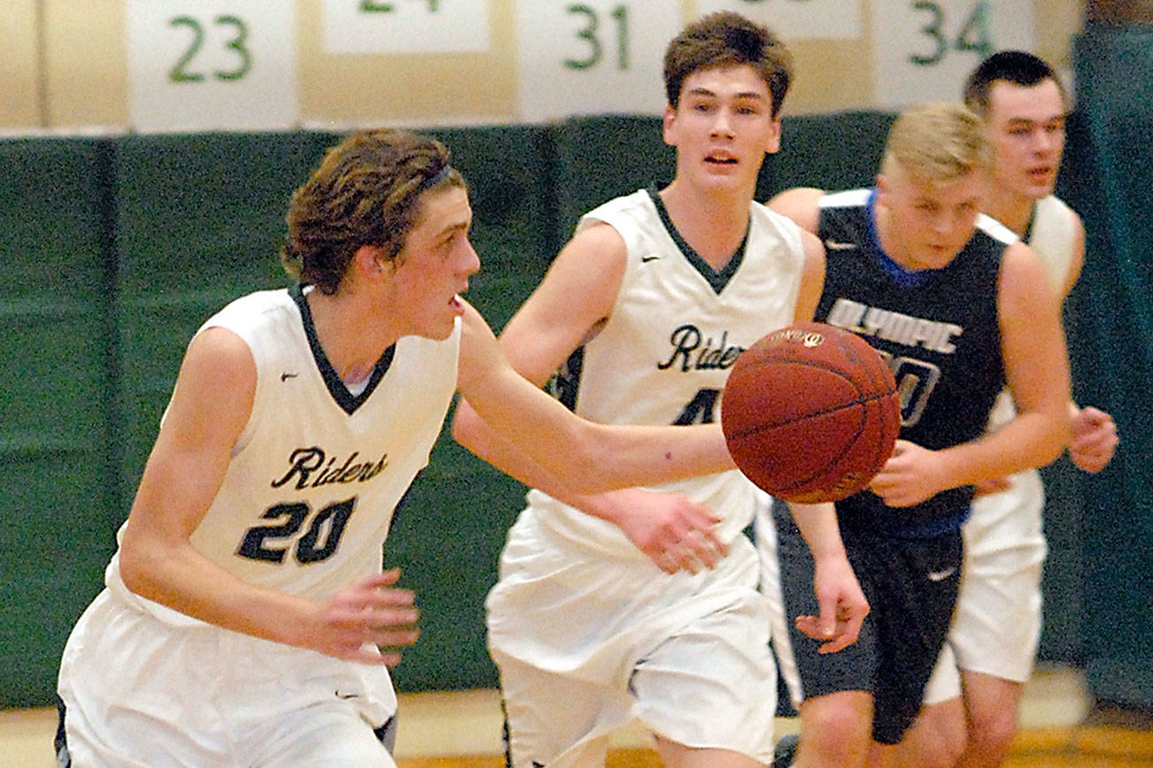 BOYS BASKETBALL: Port Angeles flips the switch after halftime in win over Olympic