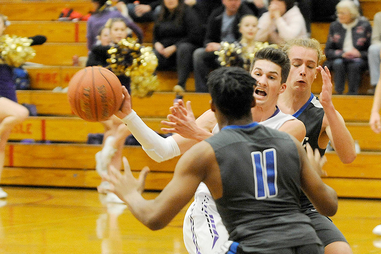 BOYS BASKETBALL ROUNDUP: Sequim seals third seed to districts; Port Angeles, Forks win big