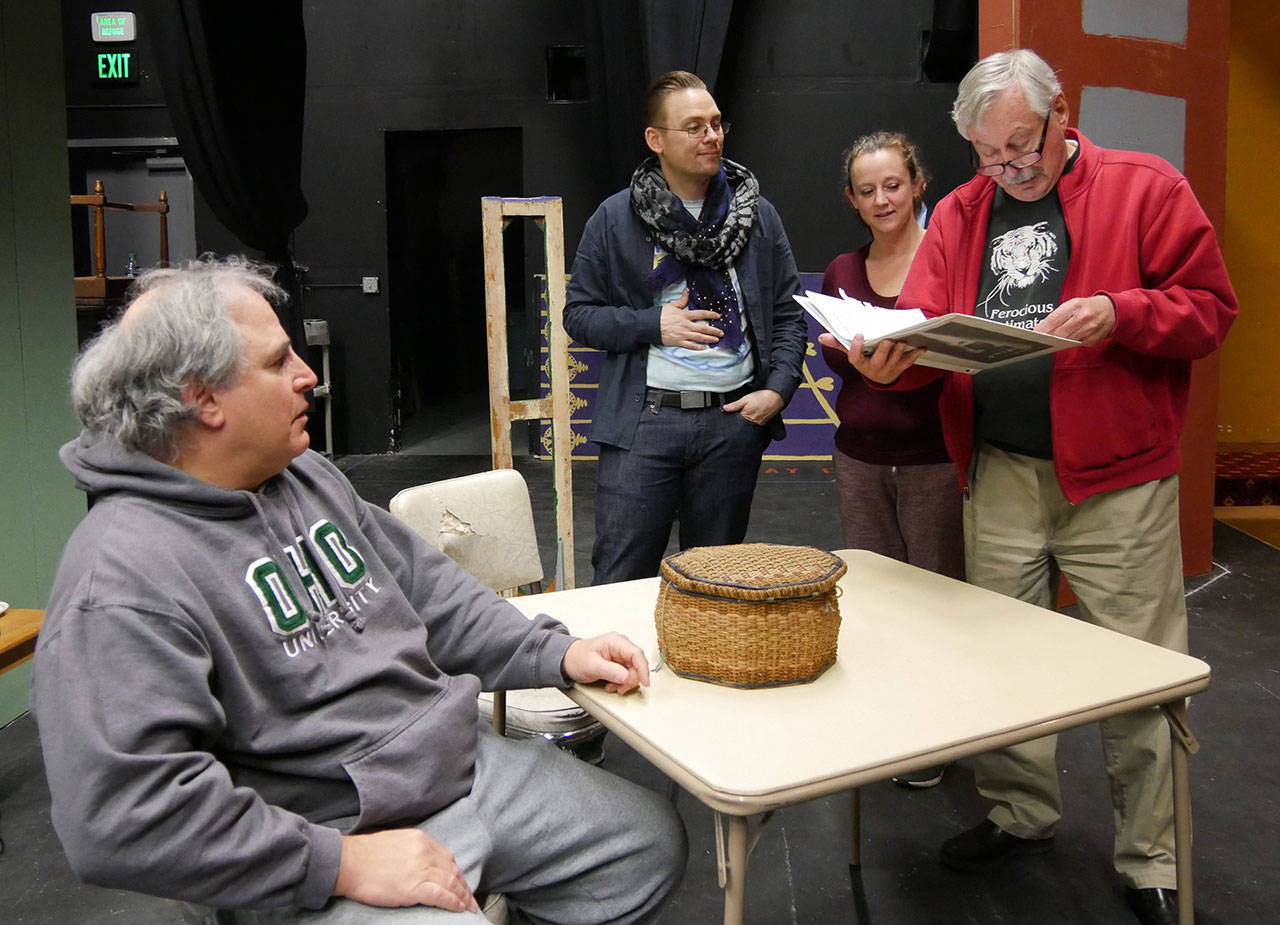 From left, “Death of a Salesman” actors Joel Hoffman, Michael Sickles and Karen Reeder work with director Merv Wingard, discussing blocking/movement in a scene. (Olympic Theatre Arts)