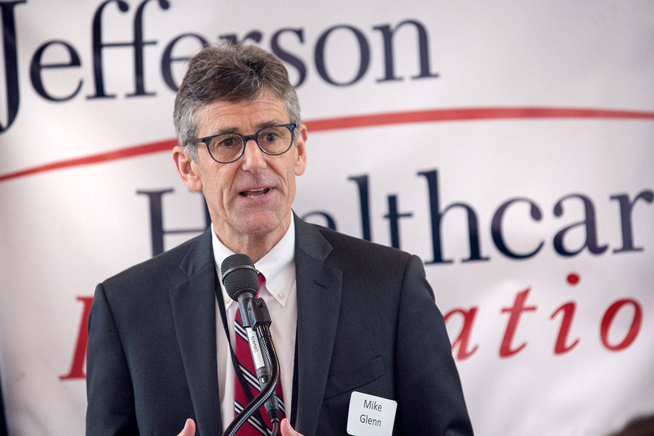 Jefferson Healthcare CEO Mike Glenn welcomes business and community leaders to the fourth annual Health Hearts luncheon in Port Townsend on Friday. (Jesse Major/Peninsula Daily News)