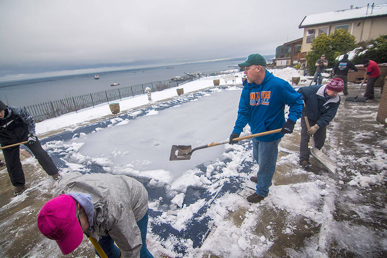 Friends remove snow for recovering coach in Port Angeles