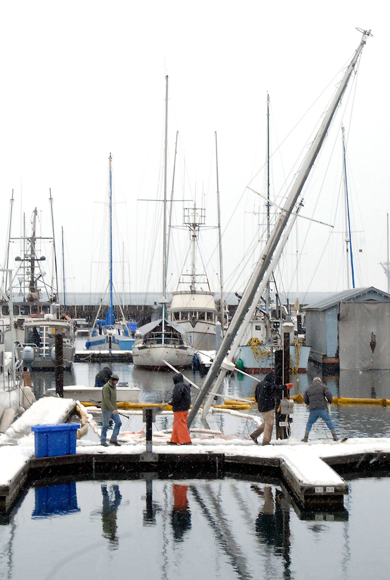 The 50-foot sailboat Fram rests on the bottom of Port Angeles Boat Haven on Wednesday morning after sinking the previous night. (Keith Thorpe/Peninsula Daily News)