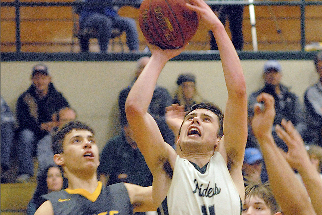 BOYS DISTRICT BASKETBALL: Port Angeles falters down the stretch, miss out on shot to clinch state regional berth, play at Sequim Friday night in loser-out game