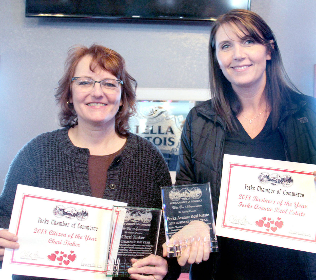 Cheri Tinker, left, of North Olympic Regional Veterans’ Housing Network and Erin Queen of Forks Avenue Real Estate received two of the Forks Chamber of Commerce’s “Best of” awards.