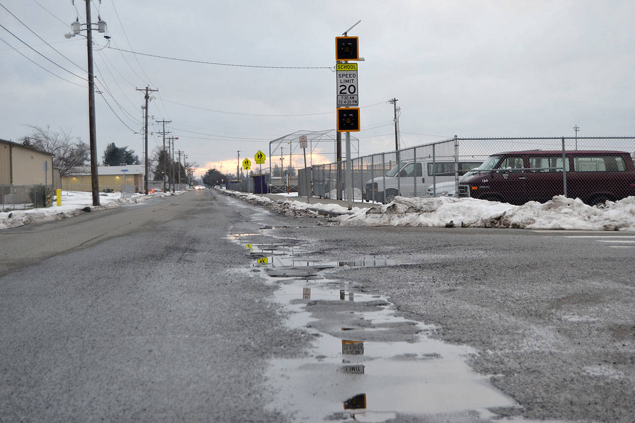 Construction appears to be only months away as City of Sequim staffers opened bids Monday for rehabilitation work along West Fir Street from Sequim Avenue to Fifth Avenue. (Matthew Nash/Olympic Peninsula News Group)