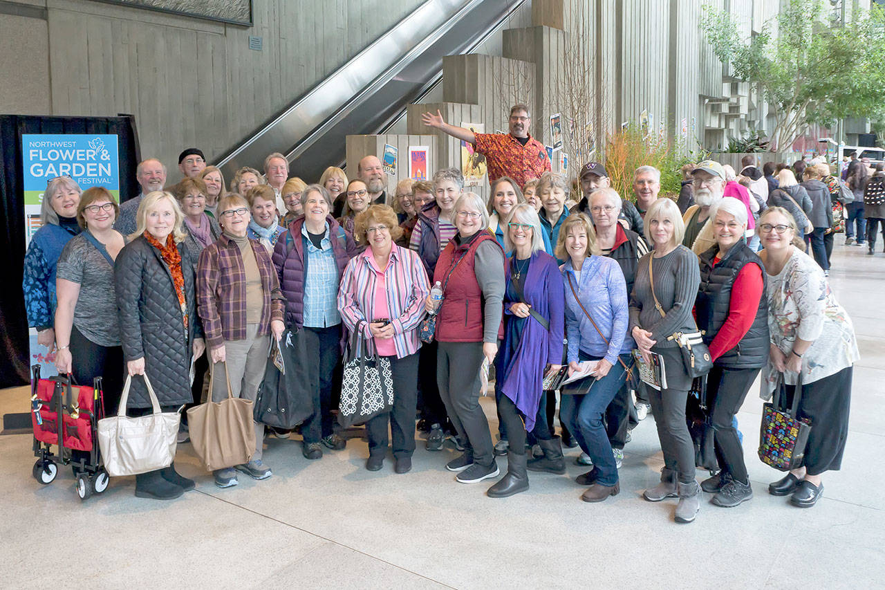 (Photo by Eric Neurath)                                The 21st annual Peninsula Daily News garden bus took 46 participants to the Pacific Northwest Flower and Garden Show this week.