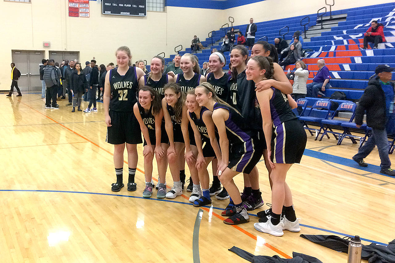 Sequim pulled off an epic comeback Friday night to advance to the Class 2A State Tournament, going on a 28-0 to close out the contest and win 54-44 The Wolves trailed 44-26 with a little over three minutes left in the third quarter and 44-33 entering the fourth quarter.                                Michael Carman/Peninsula Daily News