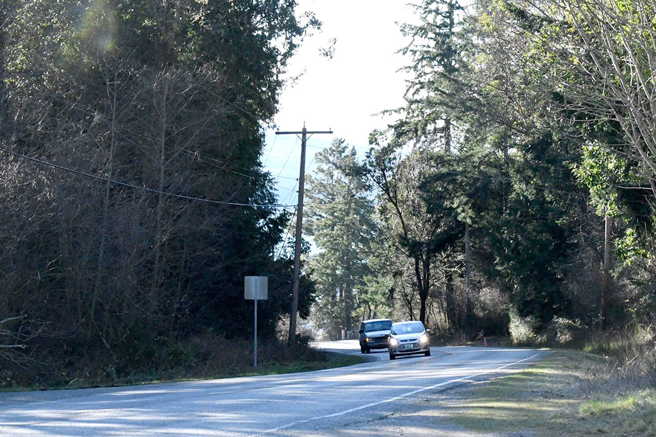 A stretch of South Discovery Road, from Milo Curry Road to milepost 3.18 near the Discovery Bay Golf Club, is slated to undergo pavement preservation work this year. (Jeannie McMacken/Peninsula Daily News)