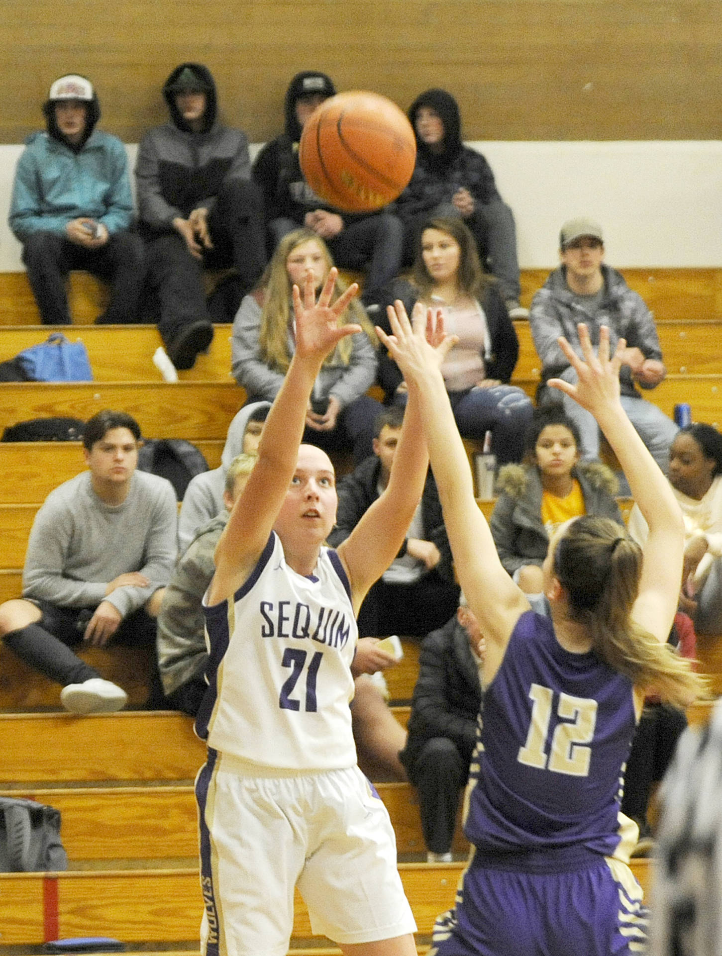 <strong>Michael Dashiell</strong>/Olympic Peninsula News Group                                Sequims Kalli Wiker, left, is shooting 42 percent on 3-point shots for the Wolves this season.