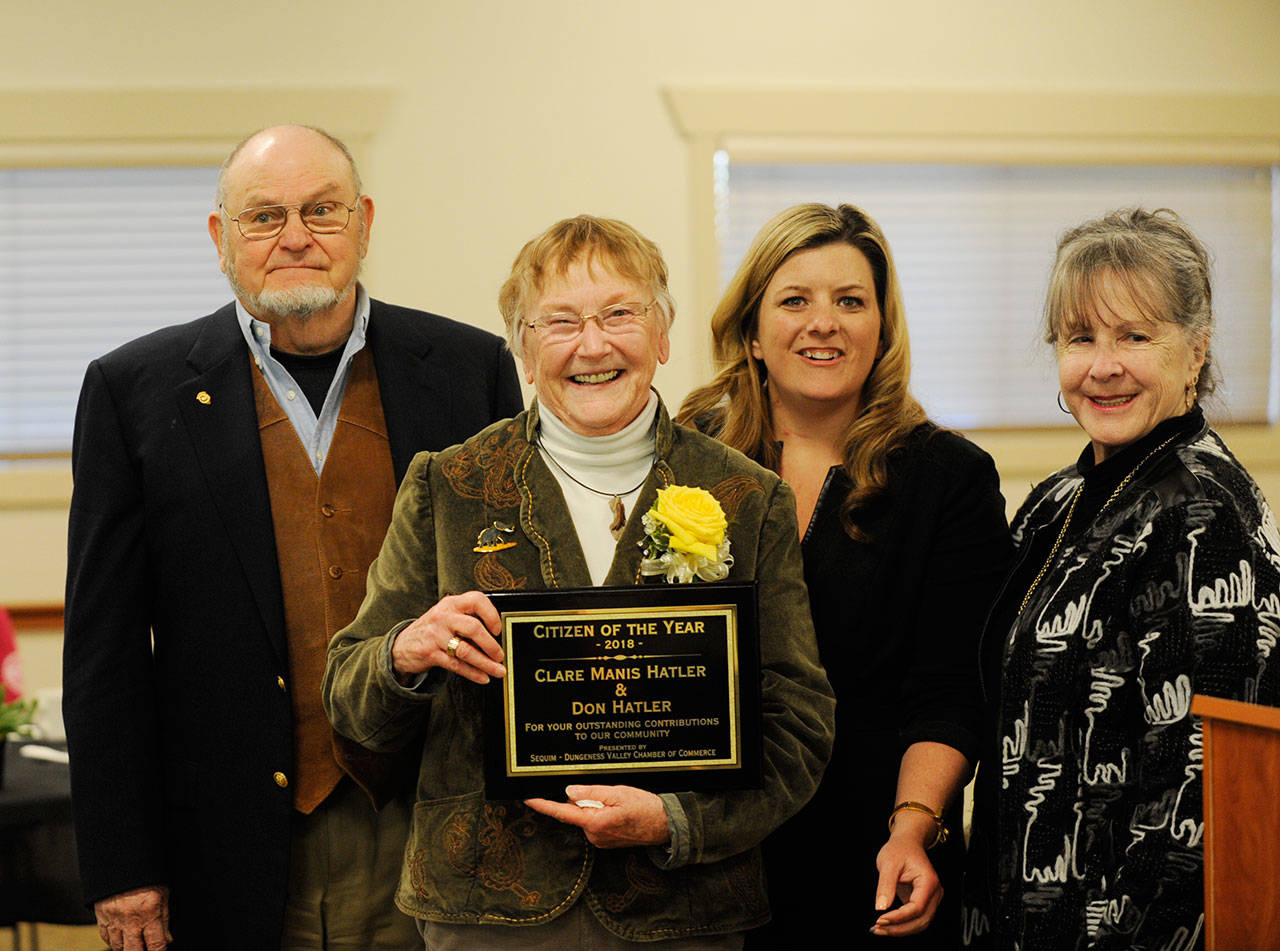 From left, Don Hatler and Clare Manis Hatler on Tuesday accept their 2018 Sequim Dungeness Valley Citizen of the Year award from Sequim chamber board President Shenna Younger and Judy Reandeau Stipe, award ceremony emcee and the 2017 Citizen of the Year honoree. (Michael Dashiell/Olympic Peninsula News Group)