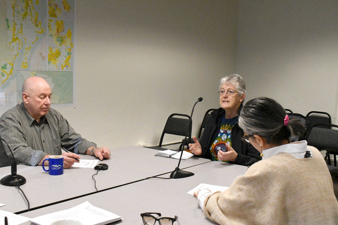 County Commissioner David Sullivan, left, and Port Townsend City Council member Michelle Sandoval, right, heard comments from homeless advocate Barbara Morey during the Joint Oversight Board on Affordable Housing & Homeless Housing meeting Tuesday. (Jeannie McMacken/Peninsula Daily News)