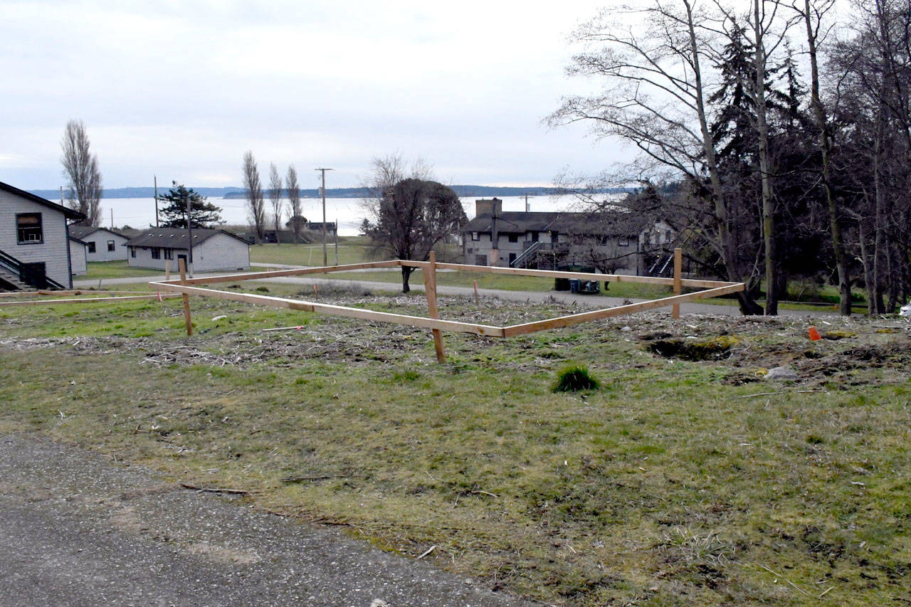 One of the 20 proposed glamping sites at Fort Worden has a view of the Strait of Juan de Fuca and Whidbey Island. The others are scattered among the trees on the northern edge of the Lifelong Learning Center grounds. (Jeannie McMacken/Peninsula Daily News)