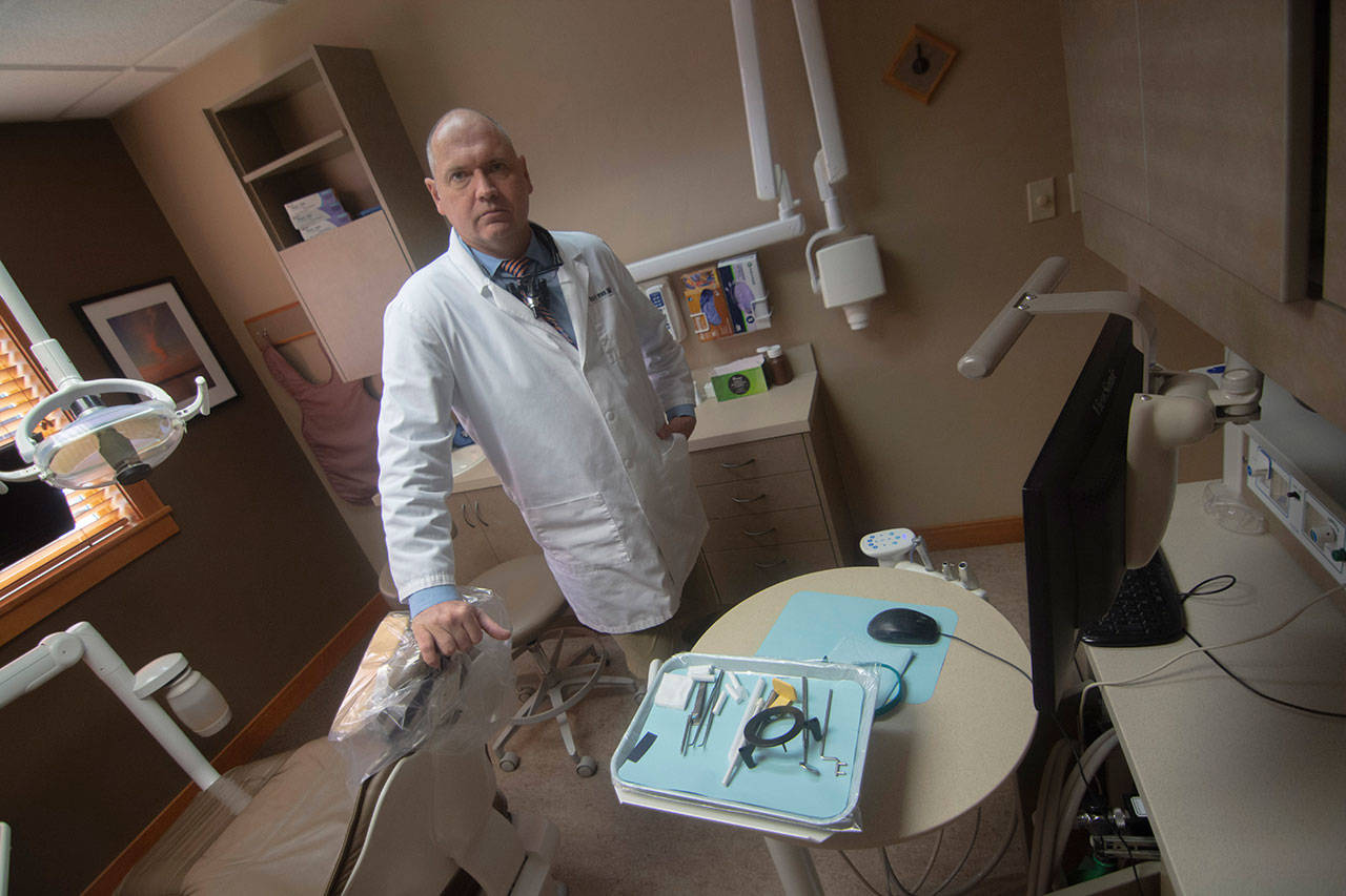 Dr. Todd Irwin is among dentists suing the state’s largest provider of dental benefits, Delta Dental of Washington, in an effort to improve transparency and to make the insurance provider more patient-focused. (Jesse Major/Peninsula Daily News)