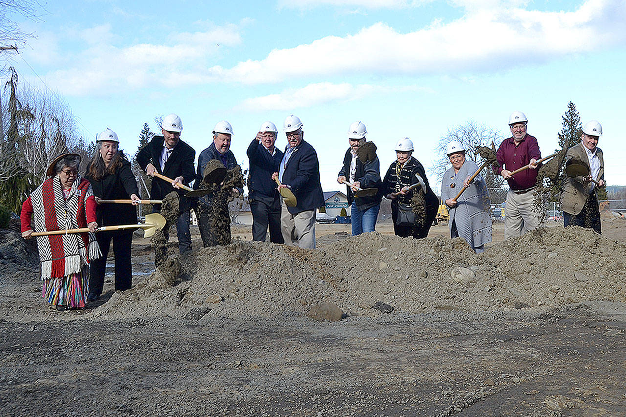 Dignitaries with the Jamestown S’Klallam Tribe gather for a ceremonial first dig for the 7 Cedars Casino and Resort expansion on Thursday in Blyn. Matthew Nash/Olympic Peninsula News Group