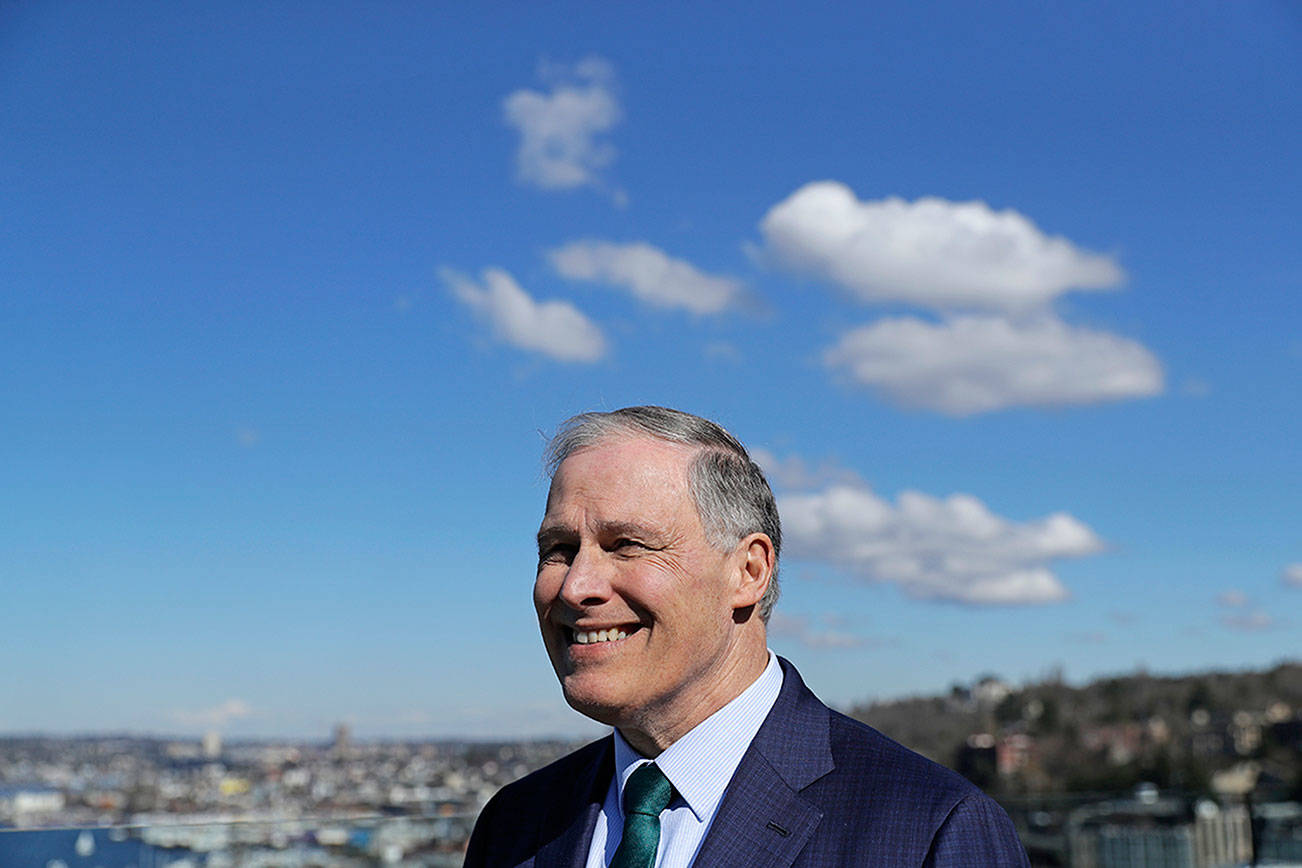 Inslee eyes national climate fight, has struggled at home