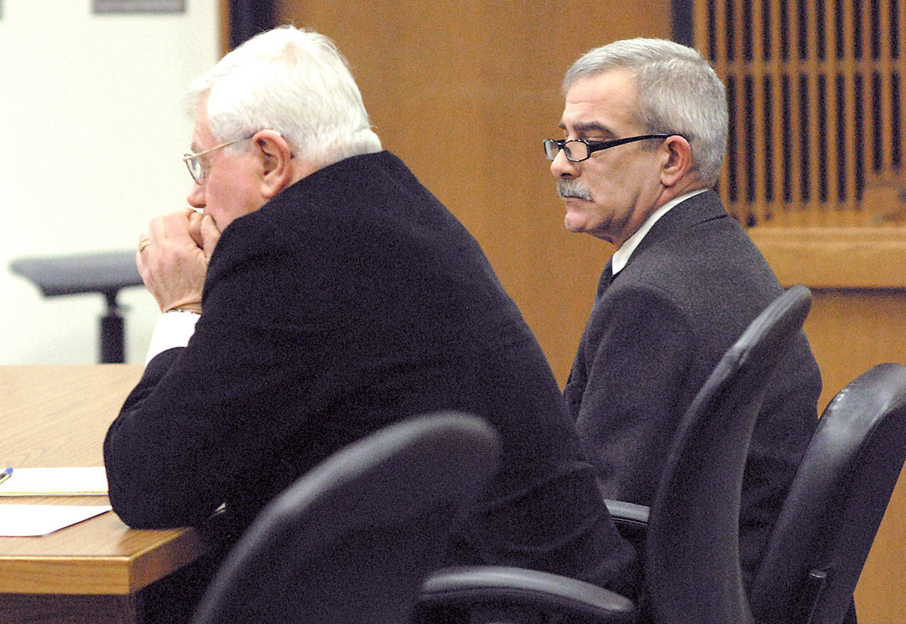 Former Clallam County Corrections Deputy Howard Blair, right, sits with attorney Larry Freedman during Blair’s sentencing Wednesday. (Keith Thorpe/Peninsula Daily News)
