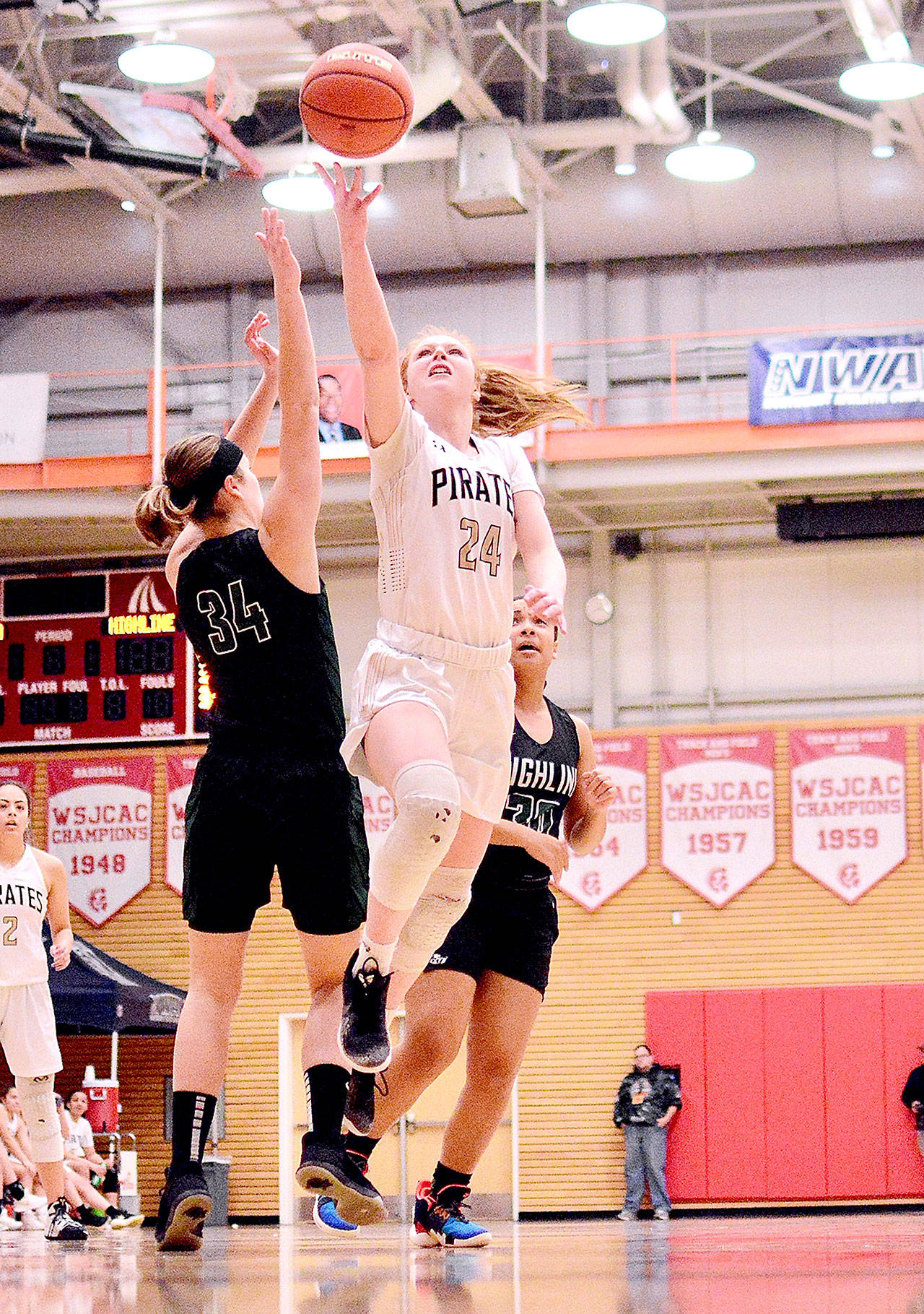 Jay Cline Peninsula Colleges Kameron Bowen goes up for a shot against Highline on Saturday. Bowen had 10 rebounds in the game as the Pirates held the Thunderbirds to just 16 points in three quarters in a 53-40 win.