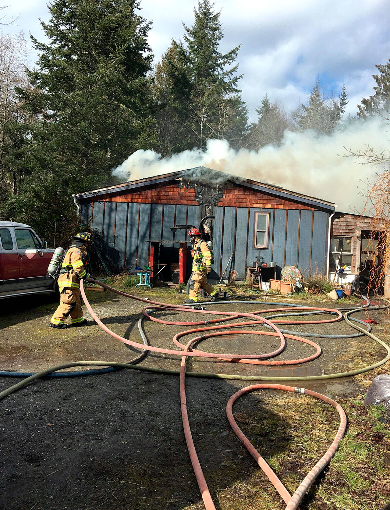 The cause of a fire that burned a home Tuesday on Hidden Trails Road in Port Townsend has not been determined. (East Jefferson Fire-Rescue)
