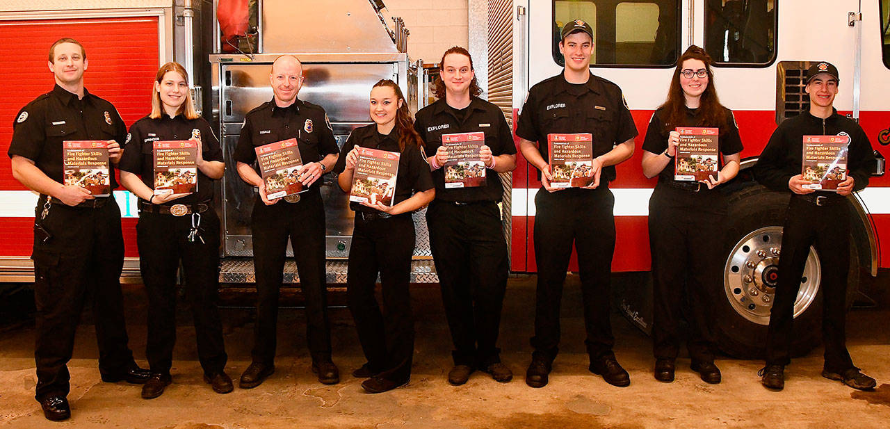 Shown, from left, are advisors Mike Jensen, Sarah Springob and Lt. Troy Tisdale, as well as Explorers Annika Volkmann, Malachi DeLano, Tristan Lowman, Annika Slowey and Theo Saxe. (Jay Cline/Clallam County Fire District No. 2)
