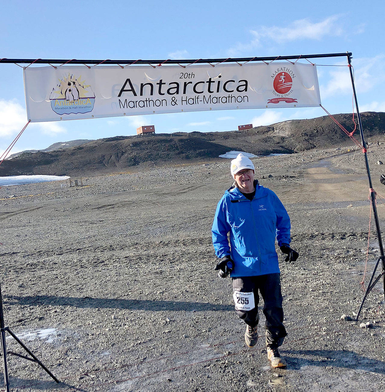 Port Angeles’ Bruce Skinner crosses the finish line after finishing a marathon on King George Island off the coast of Antarctica on March 18. Skinner fought cold and mud and steep hills to finish in 6 hours, 38 minutes, finishing second in his 70-plus age group.