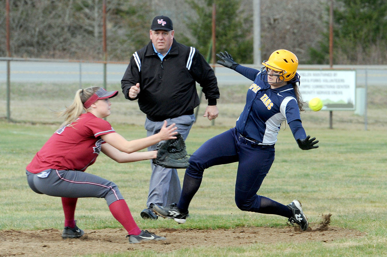 Forks’ Rian Peters, right, is tagged out on an attempted steal of second base Tuesday in Beaver by Hoquiam’s Maya Jump. Lonnie Archibald/for Peninsula Daily News