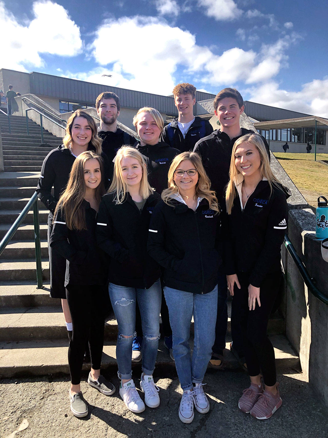 Port Angeles High School DECA students will attend the International Career Development Conference in Orlando, Fla. Pictured, in the front row, from left, are Nacia Bohman, Emma Murray, Josie Ciaciuch and Erin Frazier; the middle row, from left, are Aeverie Politika, Cole Walsh and Skyler Cobb; and, in the back row, from left, Garrett Edwards and Hayden Woods. (Kyle Benedict/Port Angeles High School DECA Club)
