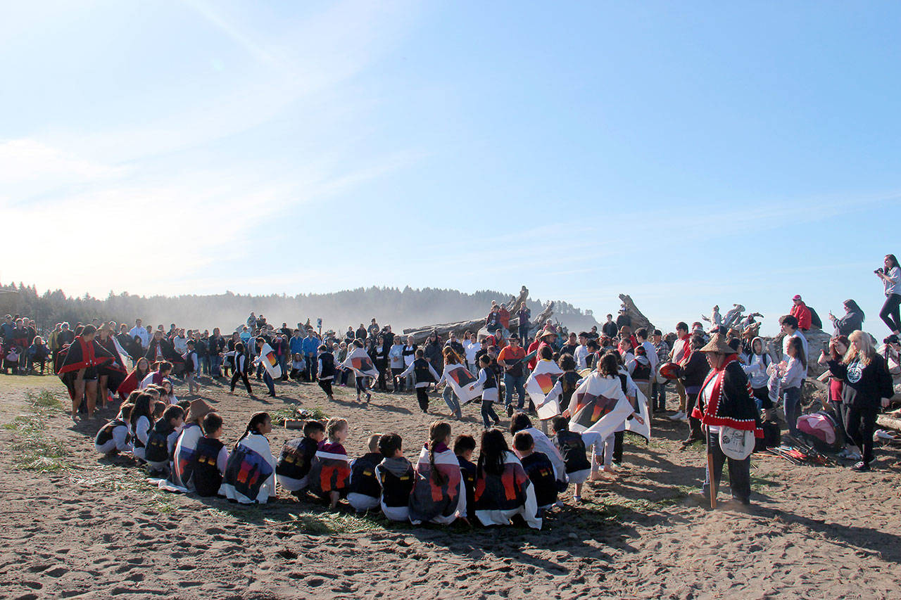 Quileute tribal members dance as part of the Welcoming the Whales Ceremony at First Beach in La Push on Friday. (Christi Baron/Olympic Peninsula News Group)