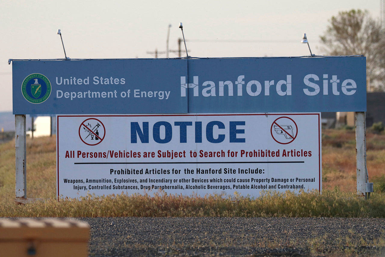 Signs are posted at a entrance to the Hanford Nuclear Reservation in Richland on May 9, 2017. (Manuel Valdes/The Associated Press)