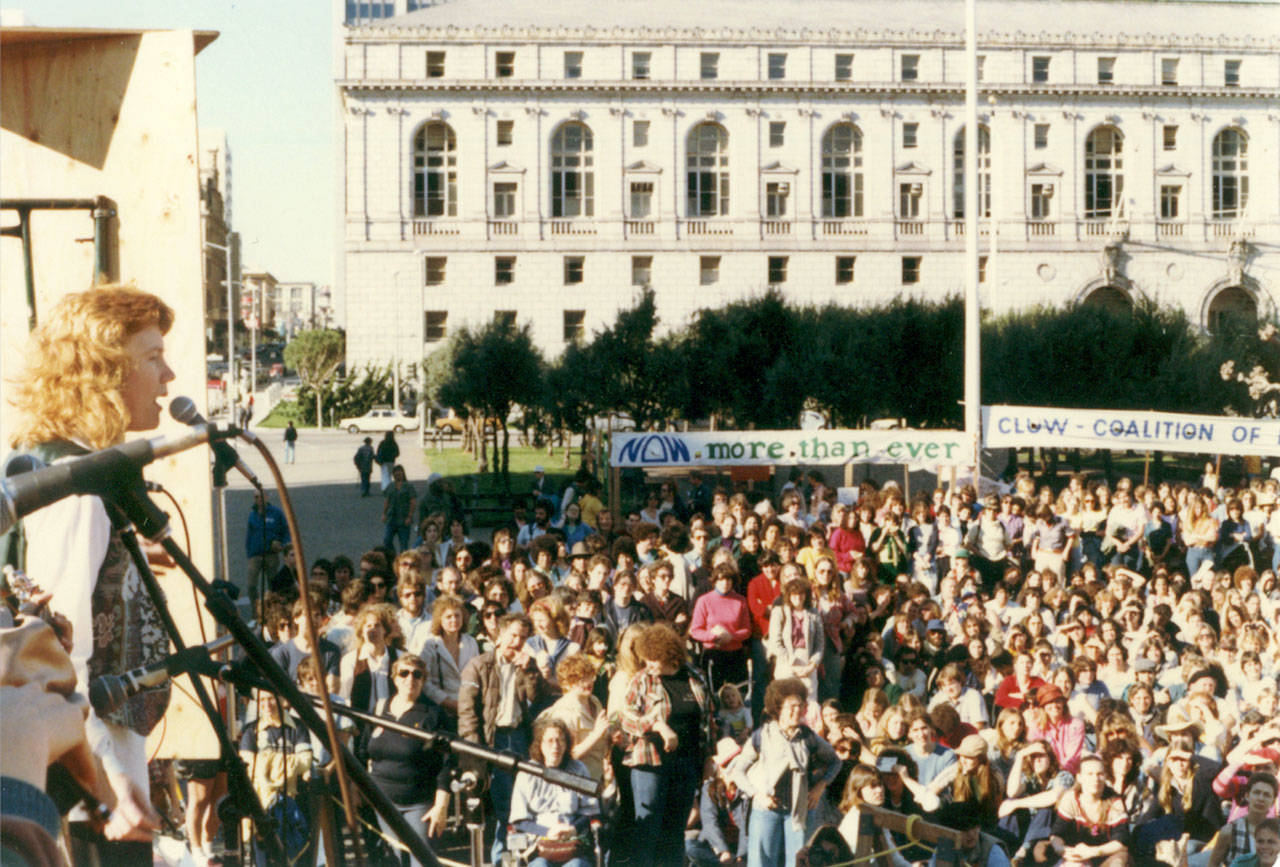 Singer and activist Holly Near, at left, speaks at a rally outside San Francisco City Hall circa 1971. Nears documentary, Singing for Our Lives, screens Saturday during Port Townsends Women & Film festival. (Holly Near Archives)