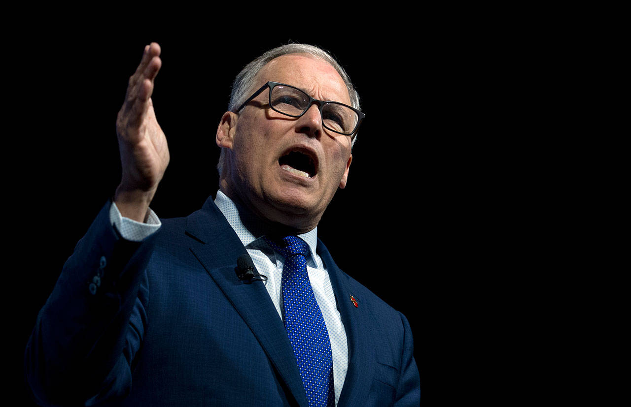 Democratic presidential candidate Gov. Jay Inslee, speaks during the We the People Membership Summit, featuring the 2020 Democratic presidential candidates, at the Warner Theater, in Washington on April 1. (AP Photo/Jose Luis Magana)