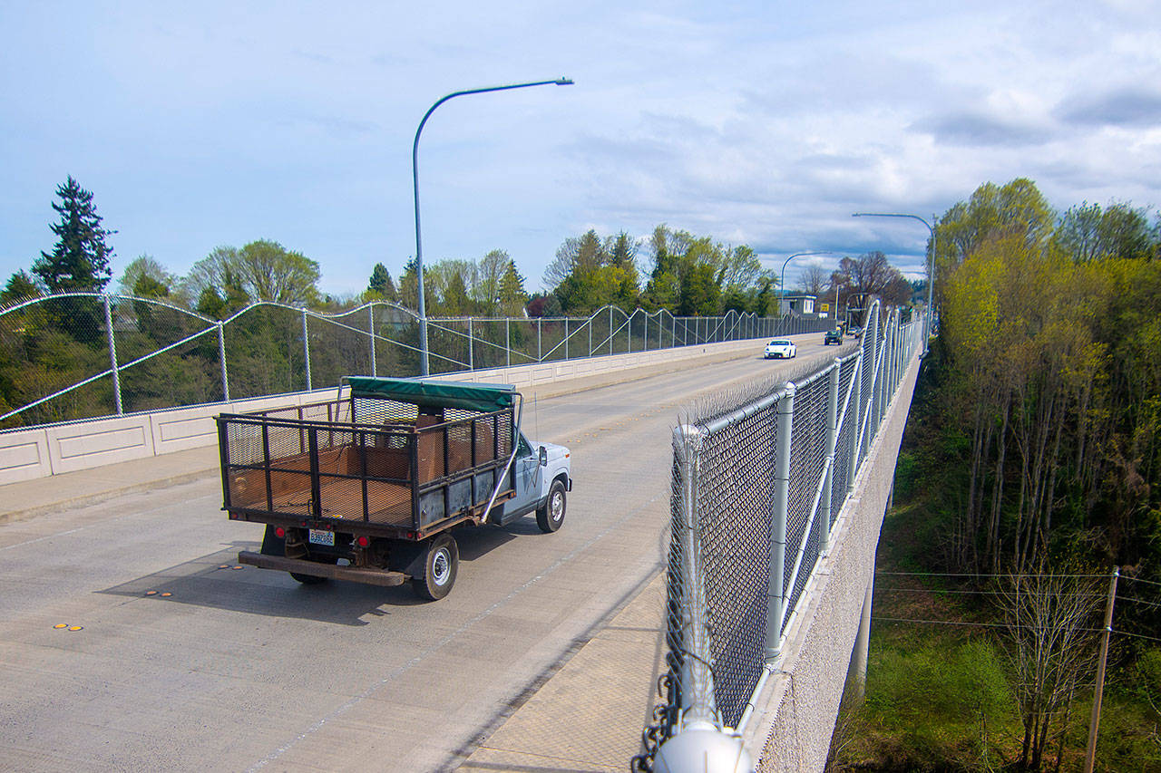 Traffic passes over the Eighth Street bridge spanning Valley Street in Port Angeles. (Jesse Major/Peninsula Daily News)