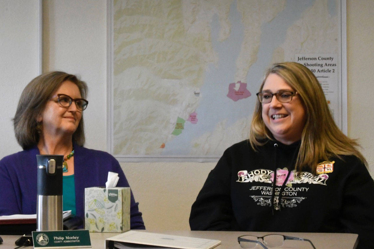Port Townsend Mayor Deborah Stinson and Rhododendron Festival President Brandi Hamon discuss plans for this year’s Rhody carnival at the Jefferson County commissioners meeting Monday. (Jeannie McMacken/Peninsula Daily News)