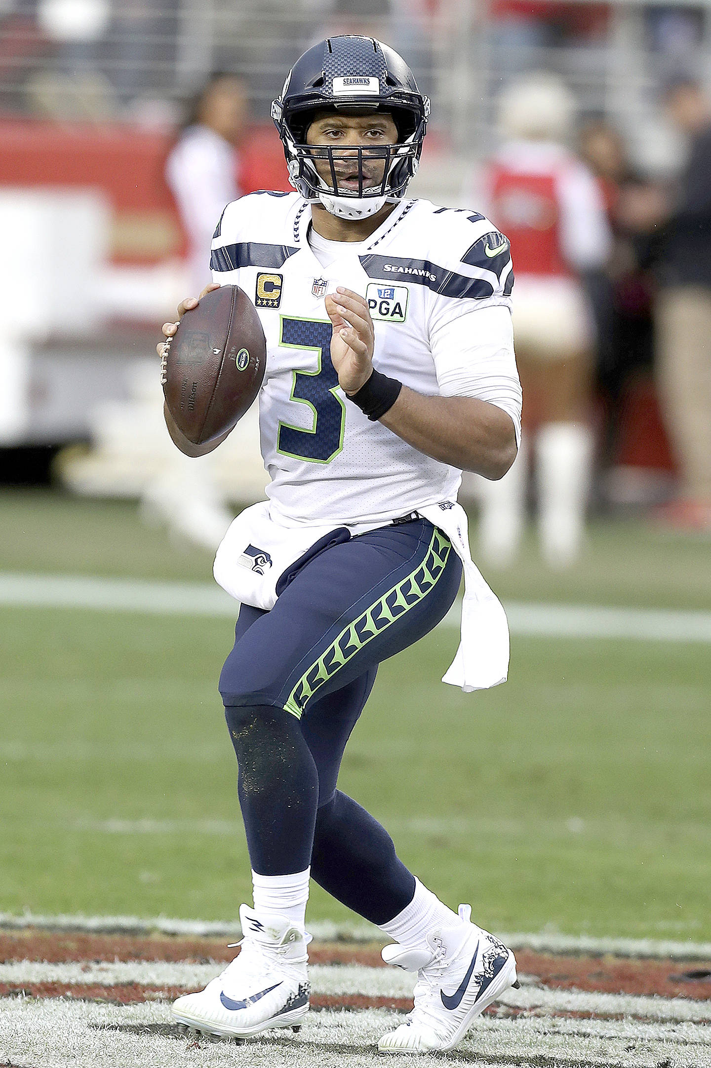 Russell Wilson of the Seattle Seahawks looks to pass the ball against the San Francisco 49ers during the Niners 26-23 overtime win over the Seahawks Sunday, December 16, 2018 at Levi’s Stadium in Santa Clara, CA.