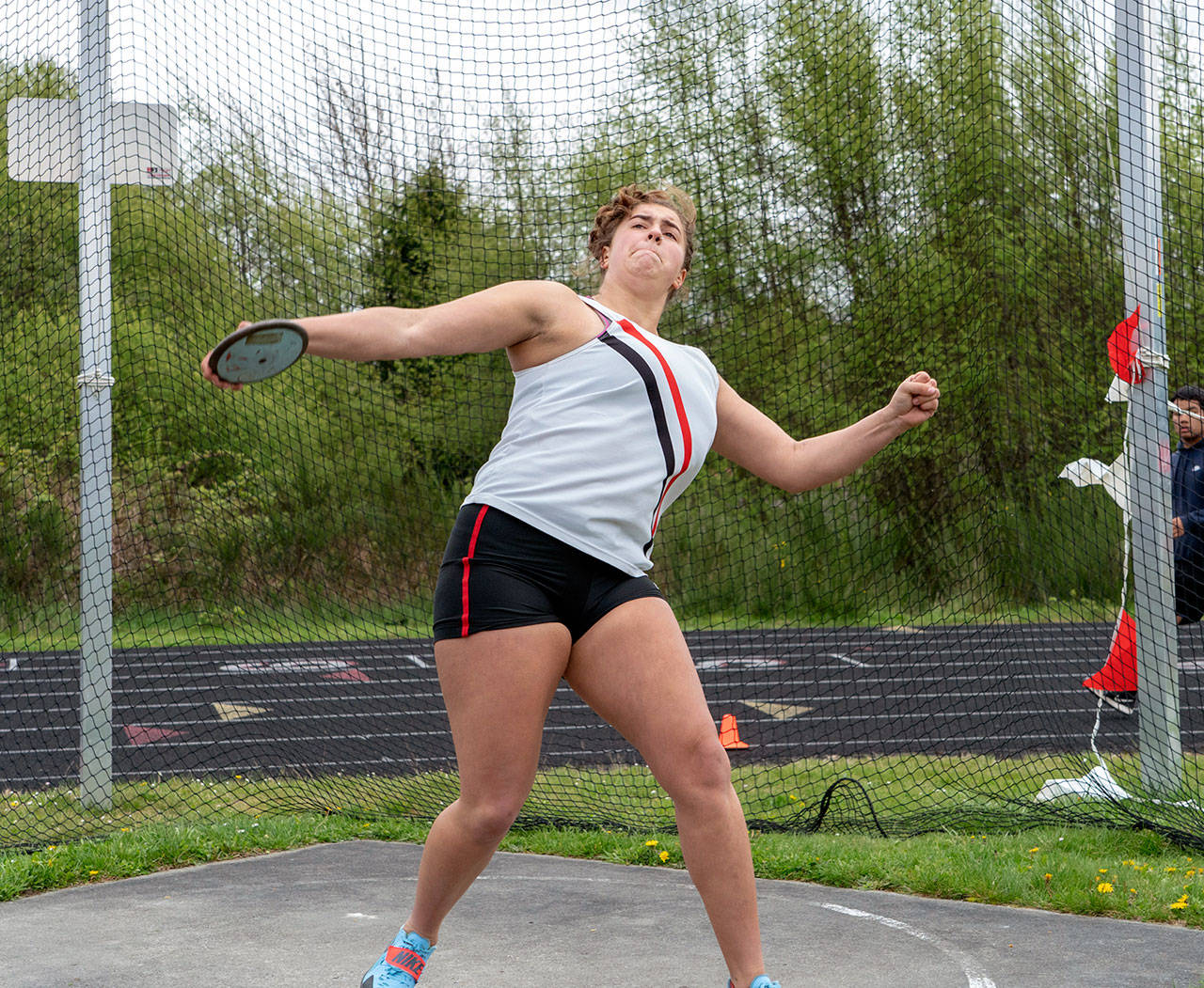 Port Townsends Brenna Franklin throws the discus during a four-school meet at Blue Heron Middle School in Port Townsend on Tuesday. Steve Mullensky/for Peninsula Daily News