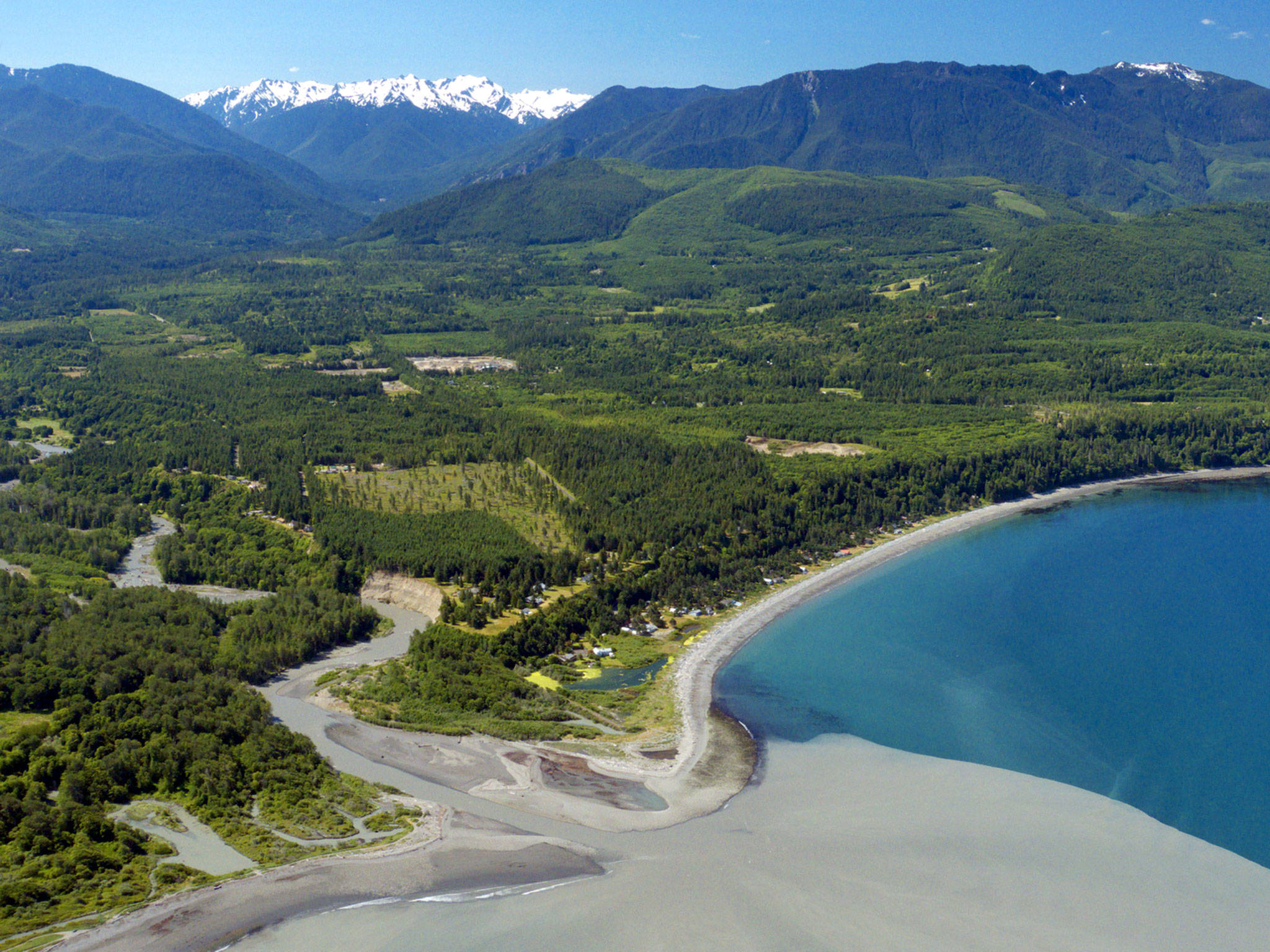 An aerial view of the mouth of the Elwha River is shown.