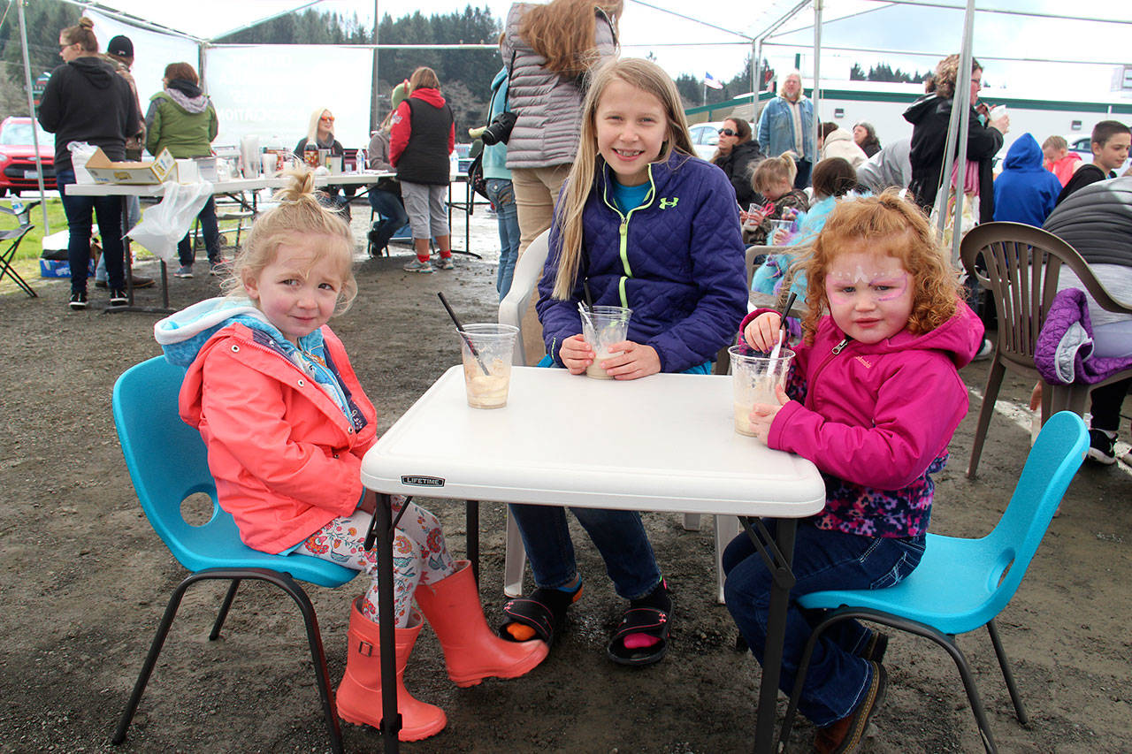 Thirsty Rainfest participants end their revelries at the Forks Outfitters parking lot where they enjoy root beer floats in 2018. Root beer floats and river trips will once again be a part of Rainfest. (Christi Baron/Olympic Peninsula News Group)