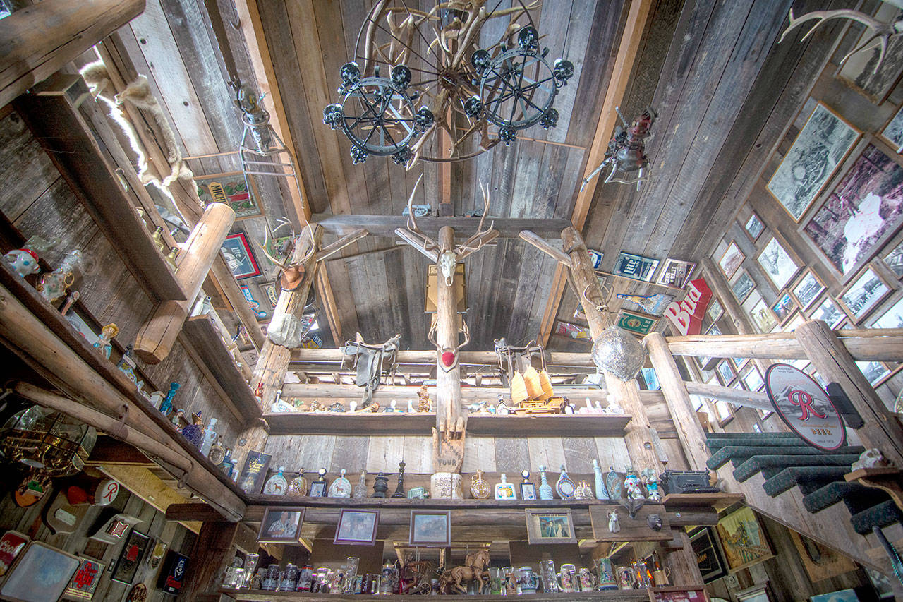 Gary Blevins collected anything that had to do with beer, bars and logging, which he had on display in his iconic Sit-N-Bull tavern in Gales Addition, Port Angeles. (Jesse Major/Peninsula Daily News)