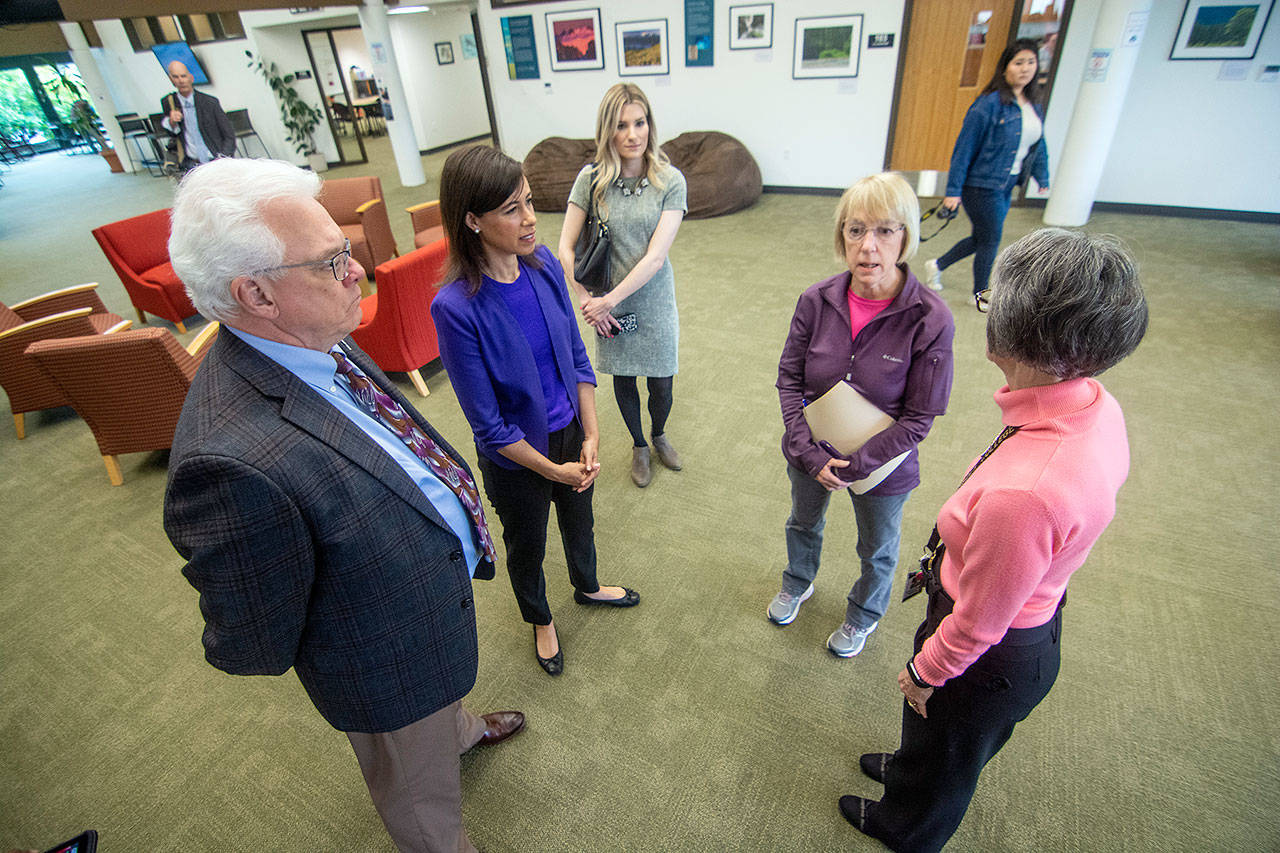 Peninsula College President Luke Robins and Peninsula College Forks Campus Director Deborah Scannell, right, talk with Jessica Rosenworcel of the FCC, middle left, and U.S. Sen. Patty Murray, middle right, as they tour Peninsula College’s Forks Campus on Tuesday. (Jesse Major/Peninsula Daily News)